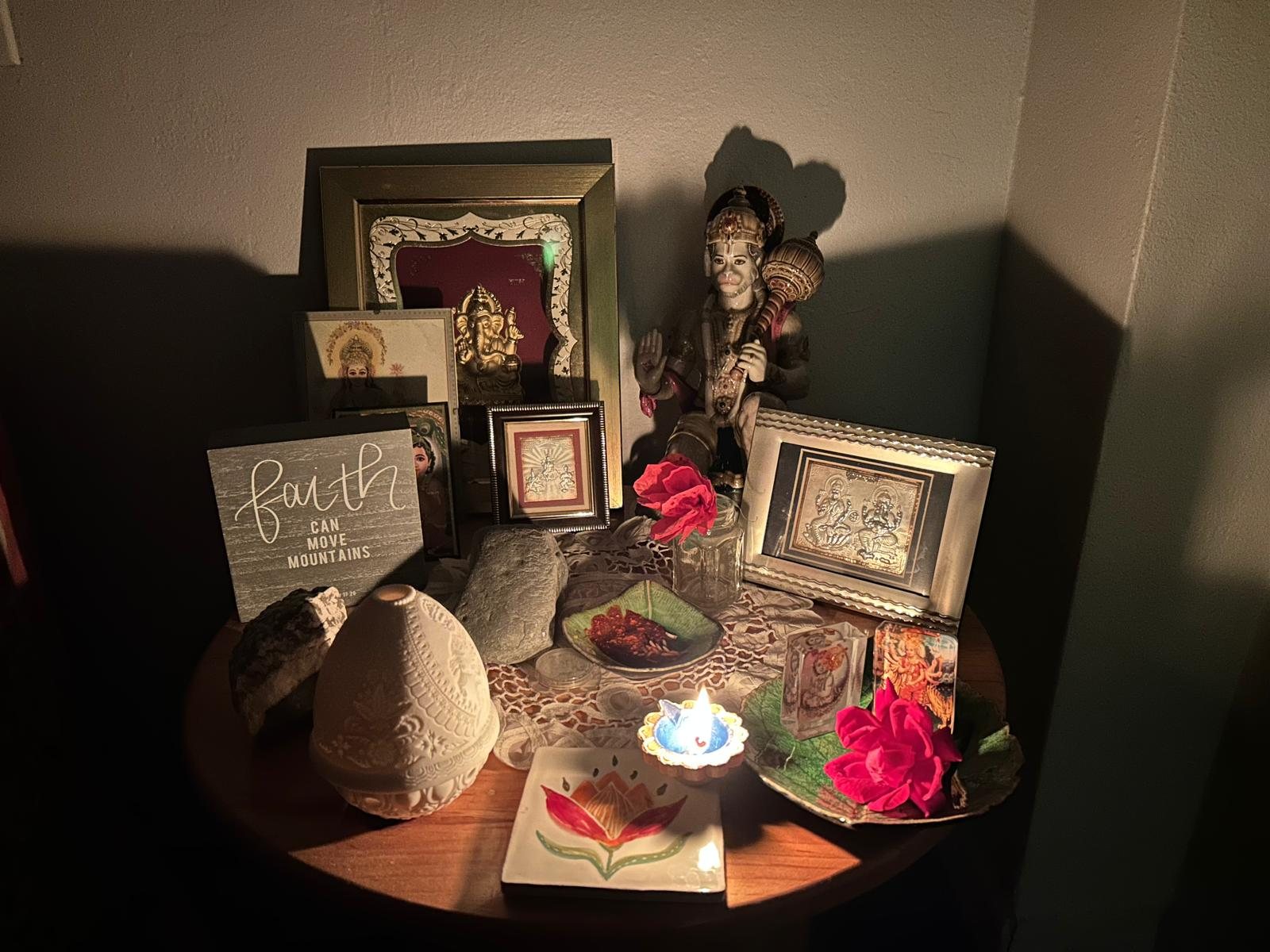 Navami altar glowing with lamplight in the evening